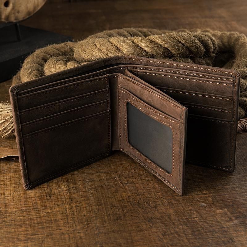 brown leather passport wallet with card slots.